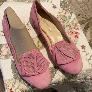 Pink suede flats made in Italy.